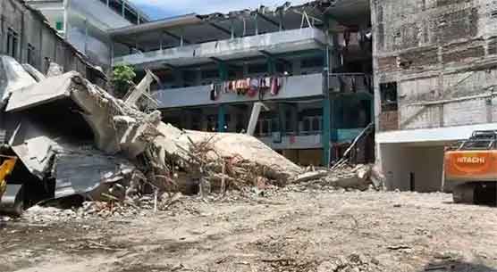 Indonesian School Building Collapse Kills 60: Rescuers Search for Survivors